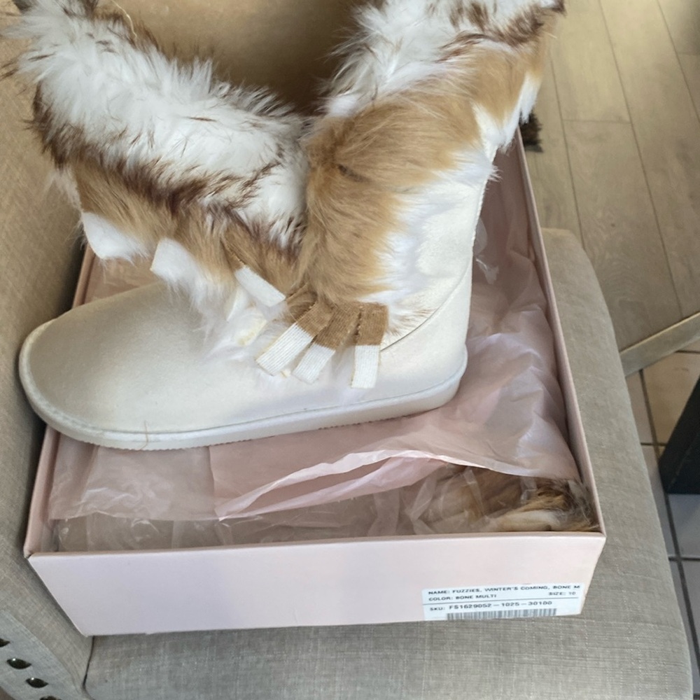 Fuzzies, Winter boots. Bone multi color . Brand new in box.